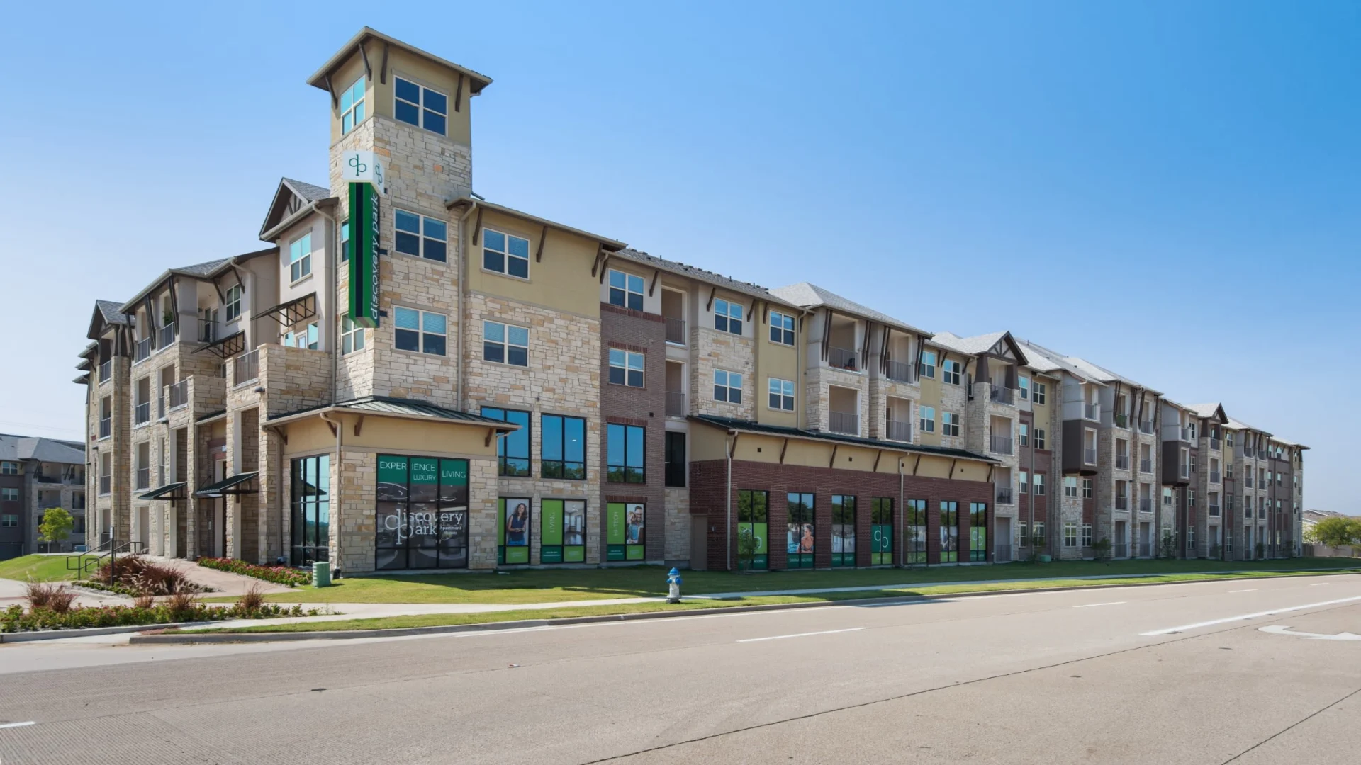 the exterior of the apartment complex at The Discovery Park